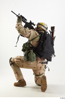  Photos Robert Watson Operator US Navy Seals aiming gun kneeling whole body 0004.jpg